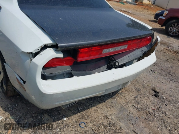 2012 Dodge Challenger SXT Plus z VIN 2C3CDYAG3CH168263, wystawiony jako IAAI lot #42283885 z przebiegiem 200 052 mil mil oraz . Historia ofert i sprzedaży dostępna na DreamBid. Obrazek 6.