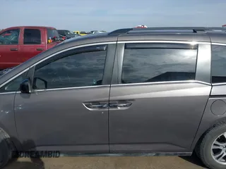 2012 Honda Odyssey EX-L with VIN 5FNRL5H60CB094682, listed as a IAAI auction lot 41570797 with 127,890 mi miles and . Bid and sale history available at carsss.com. Image 14.