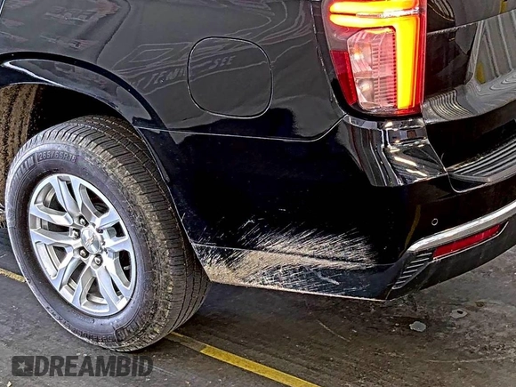 2022 Chevrolet Tahoe LS z VIN 1GNSKMKD7NR129745, wystawiony jako IAAI lot #42566236 z przebiegiem 95 126 mil mil oraz . Historia ofert i sprzedaży dostępna na DreamBid. Obrazek 19.