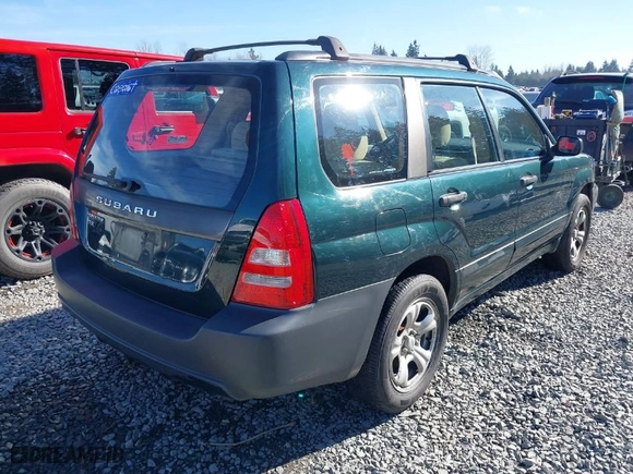 2005 Subaru Forester (Natl) X with VIN JF1SG63605G728297, listed as a IAAI auction lot 41681038 with 106,218 mi miles. Bid and sale history available at carsss.com. Image 4.