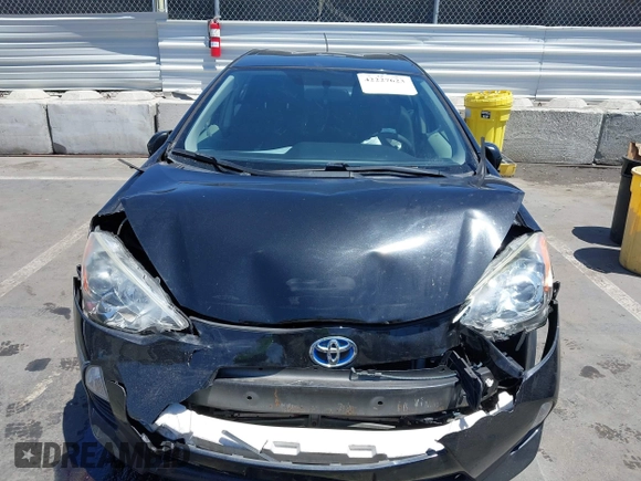 2012 Toyota Prius One z VIN JTDKDTB33C1017704, wystawiony jako IAAI lot #42227623 z przebiegiem 116 058 mil mil oraz . Historia ofert i sprzedaży dostępna na DreamBid. Obrazek 12.