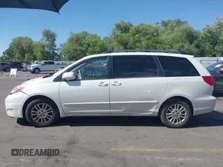 2010 Toyota Sienna XLE with VIN 5TDYK4CC3AS294129, listed as a IAAI auction lot 42510201 with 200,601 mi miles and . Bid and sale history available at DreamBid. Image 14.