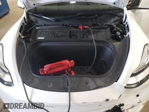 2023 Tesla Model Y Long Range z VIN 7SAYGDEE5PA067389, wystawiony jako Copart lot #54109625 z przebiegiem 24 849 mil mil oraz Szkody całkowita. Historia ofert i sprzedaży dostępna na DreamBid. Obrazek 12.