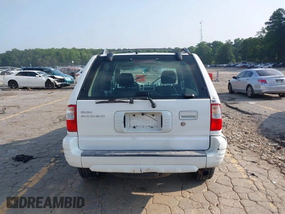 2002 Isuzu Rodeo S with VIN 4S2CK58W524321108, listed as a IAAI auction lot 42352330 with 270,614 mi miles and . Bid and sale history available at DreamBid. Image 17.
