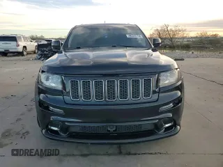 2012 Jeep Grand Cherokee SRT8 with VIN 1C4RJFDJ9CC346867, listed as a Copart auction lot 86349154 with 125,130 mi miles and Salvage Title. Bid and sale history available at carsss.com. Image 14.