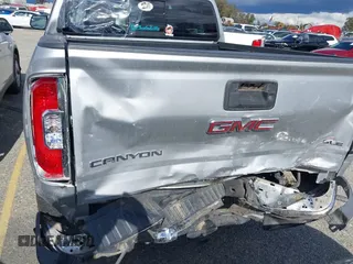 2017 GMC Canyon 4WD SLE with VIN 1GTG6CENXH1275254, listed as a IAAI auction lot 41776438 with 95,272 mi miles. Bid and sale history available at carsss.com. Image 6.