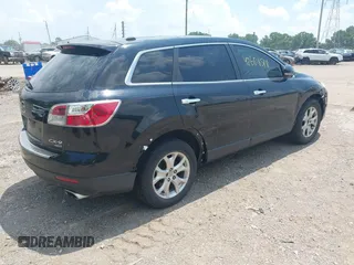 2012 Mazda CX-9 Grand Touring with VIN JM3TB3DA7C0348806, listed as a IAAI auction lot 42608518 with 229,337 mi miles and . Bid and sale history available at DreamBid. Image 4.