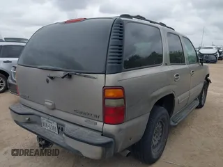 2001 Chevrolet Tahoe LS with VIN 1GNEK13T11R163918, listed as a IAAI auction lot 41886220 with 271,688 mi miles. Bid and sale history available at carsss.com. Image 4.