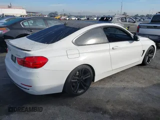 2014 BMW 4 Series 428i with VIN WBA3N3C5XEF710869, listed as a IAAI auction lot 40984116 with 115,958 mi miles and . Bid and sale history available at DreamBid. Image 4.