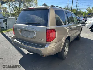2004 Honda Pilot EX with VIN 2HKYF18574H592240, listed as a IAAI auction lot 42062516 with 182,108 mi miles. Bid and sale history available at carsss.com. Image 4.