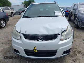 2012 Suzuki SX4 Crossover z VIN JS2YB5A35C6304967, wystawiony jako IAAI lot #42282088 z przebiegiem 152 232 mil mil oraz . Historia ofert i sprzedaży dostępna na DreamBid. Obrazek 12.