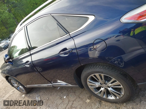 2013 Lexus RX 450h z VIN JTJBC1BA4D2052072, wystawiony jako IAAI lot #42076657 z przebiegiem 138 396 mil mil oraz . Historia ofert i sprzedaży dostępna na DreamBid. Obrazek 15.