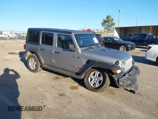 2021 Jeep Wrangler Unlimited Sport S z VIN 1C4HJXDN7MW592756, wystawiony jako IAAI lot #40592252 z przebiegiem 70 248 mil mil oraz . Historia ofert i sprzedaży dostępna na DreamBid. Obrazek 1.