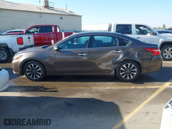 2017 Nissan Altima 2.5 SV with VIN 1N4AL3AP1HC188360, listed as a IAAI auction lot 41432809 with 72,182 mi miles. Bid and sale history available at carsss.com. Image 14.