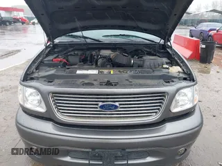 2002 Ford F-150 Harley Davidson with VIN 1FTRW07392KD29874, listed as a IAAI auction lot 41974230 with 163,279 mi miles. Bid and sale history available at carsss.com. Image 10.