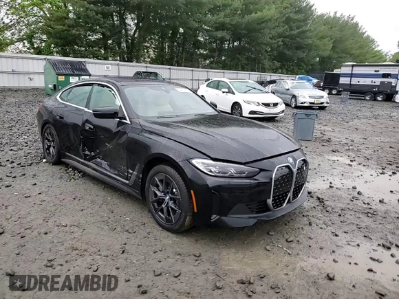 2024 BMW i4 eDrive35 with VIN WBY43AW05RFS84773, listed as a Copart auction lot 54974024 with 2,942 mi miles and Salvage Title. Bid and sale history available at carsss.com. Image 11.