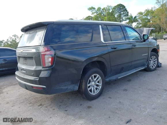 2021 Chevrolet Suburban LT with VIN 1GNSCCKD8MR269020, listed as a IAAI auction lot 41606337 with 108,305 mi miles. Bid and sale history available at carsss.com. Image 4.