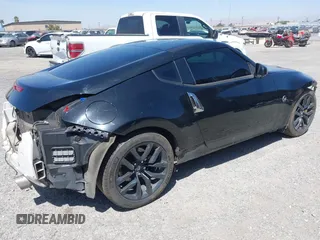 2019 Nissan 370Z Sport Touring with VIN JN1AZ4EH1KM420719, listed as a IAAI auction lot 42096816 with 97,803 mi miles and . Bid and sale history available at DreamBid. Image 4.