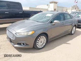 2014 Ford Fusion Titanium with VIN 3FA6P0SU0ER269411, listed as a IAAI auction lot 42163704 with 169,355 mi miles and . Bid and sale history available at DreamBid. Image 17.
