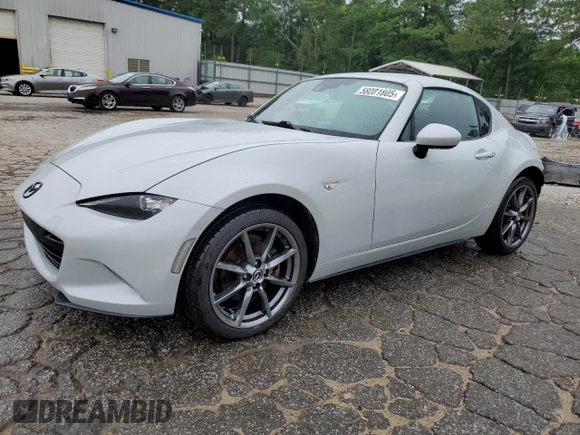 2017 Mazda MX-5 Miata Grand Touring z VIN JM1NDAM70H0104393, wystawiony jako Copart lot #58081805 z przebiegiem 76 279 mil mil oraz Szkoda całkowita • Salvage title. Historia ofert i sprzedaży dostępna na DreamBid. Obrazek 1.