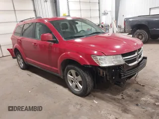 2012 Dodge Journey SXT z VIN 3C4PDDBG4CT397806, wystawiony jako IAAI lot #41333394 z przebiegiem 122 804 mil mil oraz . Historia ofert i sprzedaży dostępna na DreamBid. Obrazek 1.
