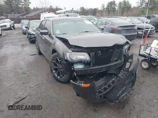 2018 Chrysler 300 with VIN 2C3CCAGGXJH226593, listed as a IAAI auction lot 41813976 with 114,557 mi miles. Bid and sale history available at carsss.com. Image 1.