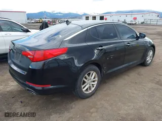 2012 Kia Optima LX with VIN KNAGM4A75C5297194, listed as a IAAI auction lot 41816301 with 119,064 mi miles. Bid and sale history available at carsss.com. Image 4.