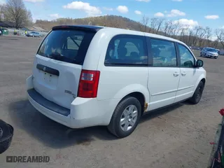 2010 Dodge Grand Caravan SE with VIN 2D4RN4DE0AR107498, listed as a IAAI auction lot 42048596 with 242,643 mi miles. Bid and sale history available at carsss.com. Image 4.