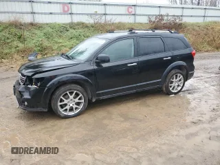 2014 Dodge Journey R/T with VIN 3C4PDDFG4ET117900, listed as a Copart auction lot 80911244 with 111,773 mi miles and Clean title. Bid and sale history available at DreamBid. Image 1.