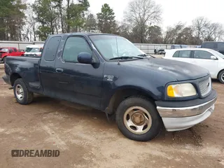 1999 Ford F-150 with VIN 1FTRX07W3XKC24438, listed as a IAAI auction lot 41634802 with Not provided miles and . Bid and sale history available at DreamBid. Image 1.