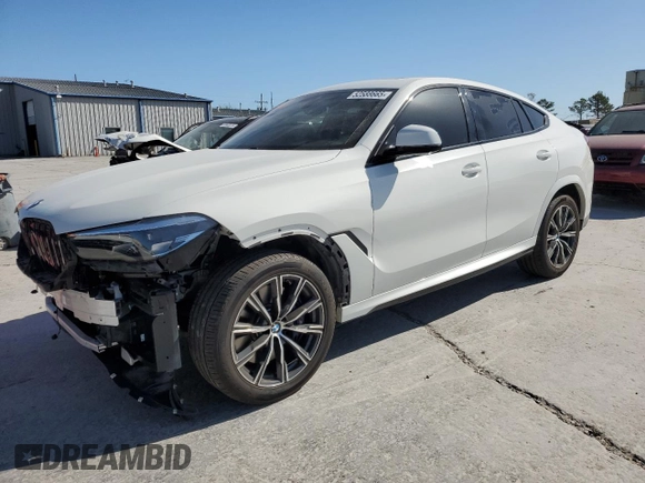 2020 BMW X6 xDrive40i z VIN 5UXCY6C00L9D45082, wystawiony jako Copart lot #52588665 z przebiegiem 40 810 mil mil oraz Szkoda całkowita • Salvage title. Historia ofert i sprzedaży dostępna na DreamBid. Obrazek 1.