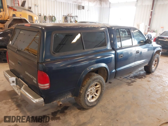 2003 Dodge Dakota SLT with VIN 1D7HL48N63S177233, listed as a IAAI auction lot 42167711 with 163,511 mi miles and . Bid and sale history available at carsss.com. Image 4.