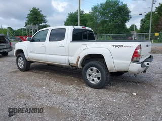 2013 Toyota Tacoma PreRunner z VIN 5TFKU4HN6DX003129, wystawiony jako IAAI lot #42190939 z przebiegiem 206 404 mil mil oraz . Historia ofert i sprzedaży dostępna na DreamBid. Obrazek 3.