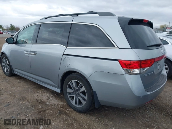 2016 Honda Odyssey Touring Elite with VIN 5FNRL5H99GB107896, listed as a IAAI auction lot 42040395 with 162,120 mi miles and . Bid and sale history available at carsss.com. Image 3.