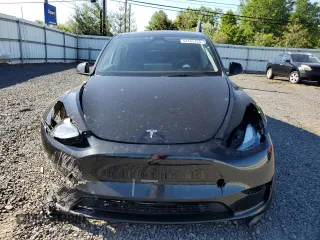 2023 Tesla Model Y Long Range z VIN 7SAYGDEE1PF865195, wystawiony jako Copart lot #57455765 z przebiegiem 32 011 mil mil oraz Szkoda całkowita • Salvage title. Historia ofert i sprzedaży dostępna na DreamBid. Obrazek 5.