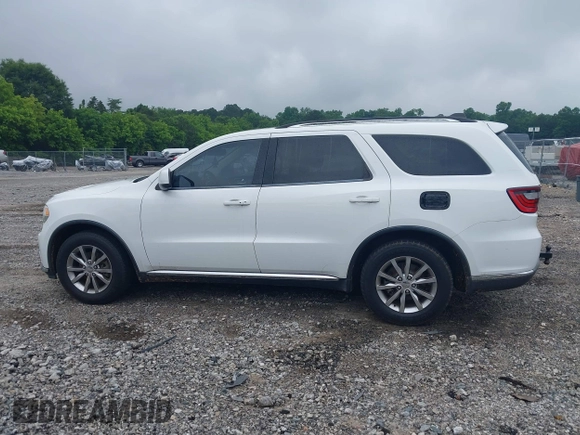 2016 Dodge Durango SXT with VIN 1C4RDHAG2GC330995, listed as a IAAI auction lot 42410612 with 118,412 mi miles and . Bid and sale history available at DreamBid. Image 14.