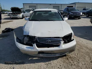 2000 Toyota Camry CE z VIN JT2BG28K8Y0467211, wystawiony jako Copart lot #55478835 z przebiegiem Nie podano mil oraz Szkoda całkowita • Salvage title. Historia ofert i sprzedaży dostępna na DreamBid. Obrazek 5.