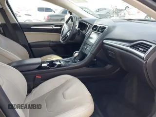 2016 Ford Fusion Titanium with VIN 3FA6P0SU9GR145186, listed as a IAAI auction lot 42023484 with 84,399 mi miles and . Bid and sale history available at DreamBid. Image 5.