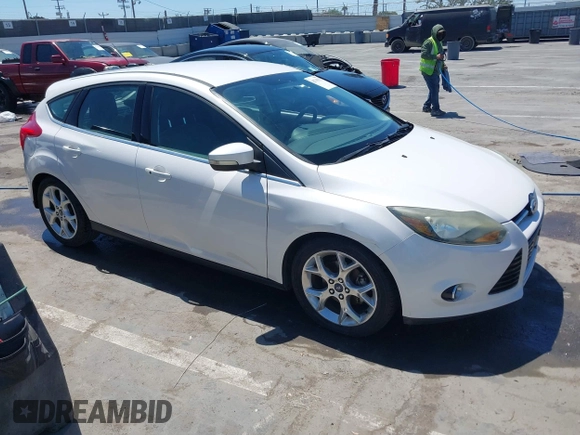 2014 Ford Focus Titanium with VIN 1FADP3N27EL330366, listed as a IAAI auction lot 42719377 with 97,009 mi miles and . Bid and sale history available at DreamBid. Image 1.