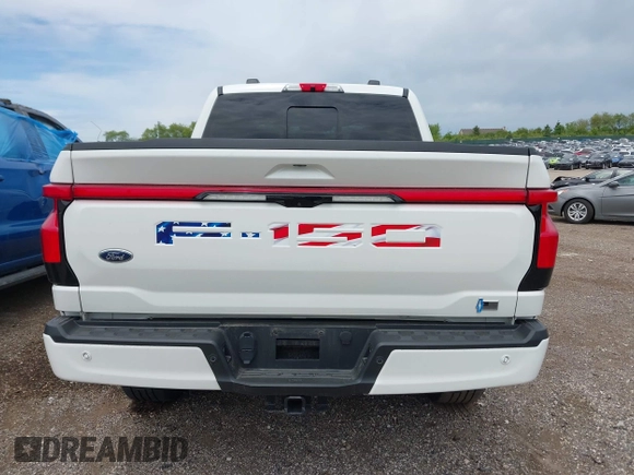 2022 Ford F-150 Lightning Pro with VIN 1FTVW1EL3NWG16132, listed as a IAAI auction lot 42362459 with 16,509 mi miles and . Bid and sale history available at DreamBid. Image 17.