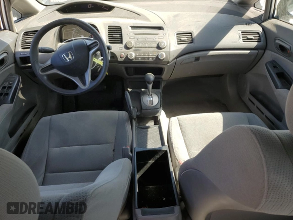 2010 Honda Civic DX-VP z VIN 19XFA1F32AE080022, wystawiony jako Copart lot #57983445 z przebiegiem 154 065 mil mil oraz Szkoda całkowita • Salvage title. Historia ofert i sprzedaży dostępna na DreamBid. Obrazek 8.