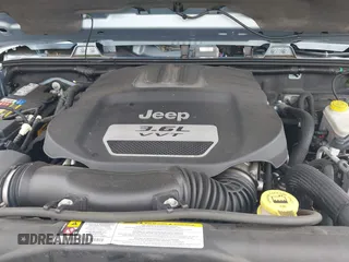 2012 Jeep Wrangler Arctic with VIN 1C4AJWBG7CL148325, listed as a IAAI auction lot 39943602 with 86,625 mi miles and . Bid and sale history available at DreamBid. Image 10.