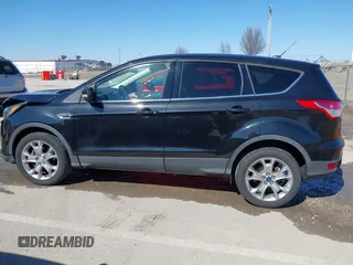2013 Ford Escape SEL with VIN 1FMCU0HX4DUB31123, listed as a IAAI auction lot 41740392 with 171,239 mi miles. Bid and sale history available at carsss.com. Image 14.