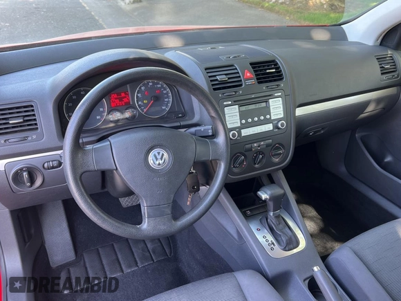 2007 Volkswagen Rabbit z VIN WVWBR71K57W214576, wystawiony jako Copart lot #55692465 z przebiegiem 57 793 mil mil oraz Czysty tytuł • Clean title. Historia ofert i sprzedaży dostępna na DreamBid. Obrazek 9.