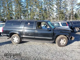 1999 GMC Suburban z VIN 3GKFK16R2XG524342, wystawiony jako IAAI lot #41682292 z przebiegiem 161 536 mil mil oraz . Historia ofert i sprzedaży dostępna na DreamBid. Obrazek 13.
