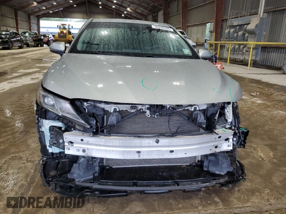 2023 Toyota Camry LE z VIN 4T1C11AK6PU082458, wystawiony jako Copart lot #56209395 z przebiegiem 38 806 mil mil oraz Szkoda całkowita • Salvage title. Historia ofert i sprzedaży dostępna na DreamBid. Obrazek 5.