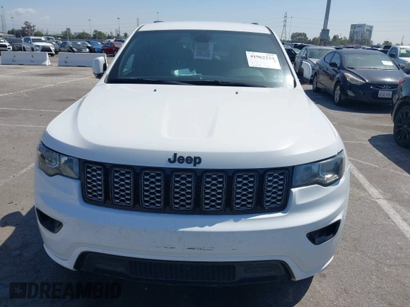 2019 Jeep Grand Cherokee Altitude with VIN 1C4RJEAG8KC832538, listed as a IAAI auction lot 41962224 with 104,321 mi miles and . Bid and sale history available at DreamBid. Image 12.