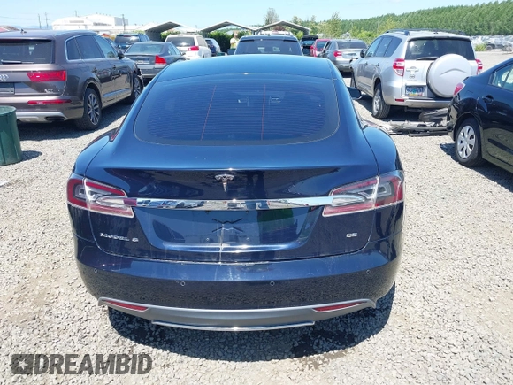 2014 Tesla Model S 60 with VIN 5YJSA1H18EFP31969, listed as a IAAI auction lot 42312485 with 90,043 mi miles and . Bid and sale history available at DreamBid. Image 17.