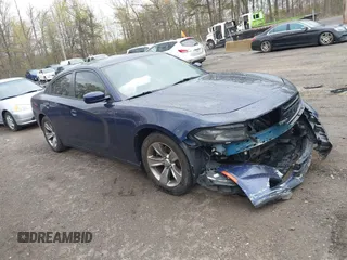 2015 Dodge Charger SXT with VIN 2C3CDXHG5FH878642, listed as a IAAI auction lot 42035569 with 228,000 mi miles and . Bid and sale history available at DreamBid. Image 1.