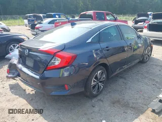 2016 Honda Civic EX-L with VIN 19XFC1F79GE003492, listed as a IAAI auction lot 42563306 with 166,420 mi miles and . Bid and sale history available at DreamBid. Image 4.